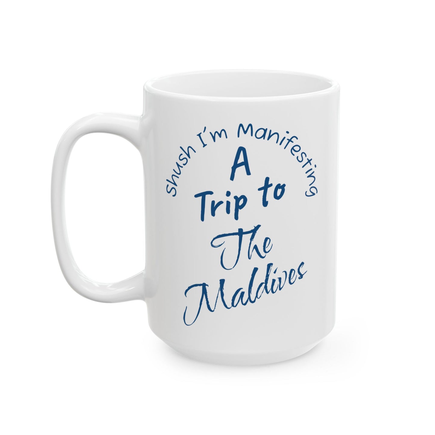 A Trip To The Maldives Ceramic Mug — 'Shush I'm Manifesting' In Blue On White Coffee Cup (11oz & 15oz)