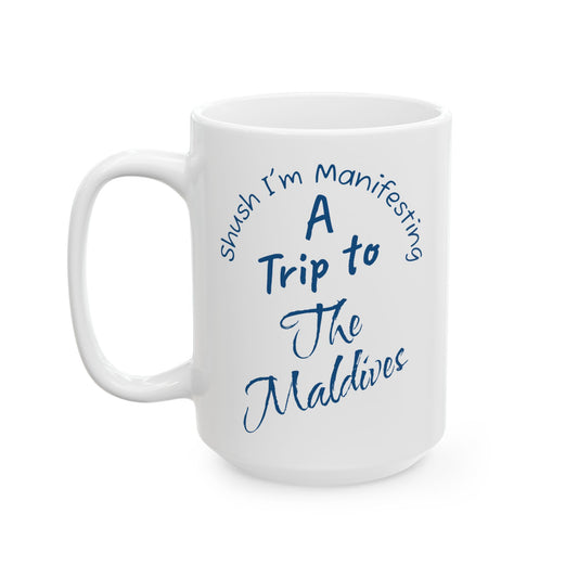 A Trip To The Maldives Ceramic Mug — 'Shush I'm Manifesting' In Blue On White Coffee Cup (11oz & 15oz)
