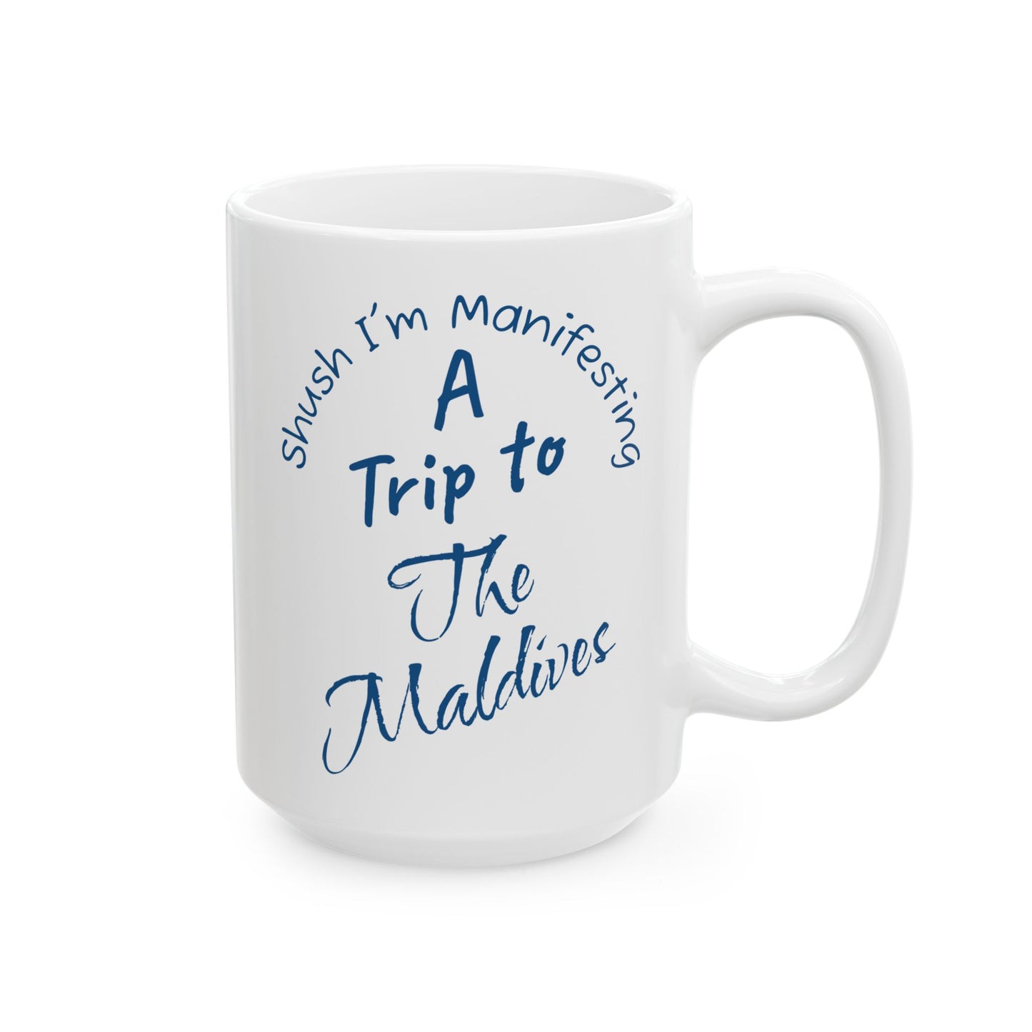 A Trip To The Maldives Ceramic Mug — 'Shush I'm Manifesting' In Blue On White Coffee Cup (11oz & 15oz)