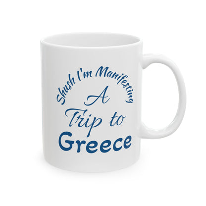 A Trip to Greece Ceramic Mug — 'Shush I'm Manifesting' Coffee Cup (11oz & 15oz)
