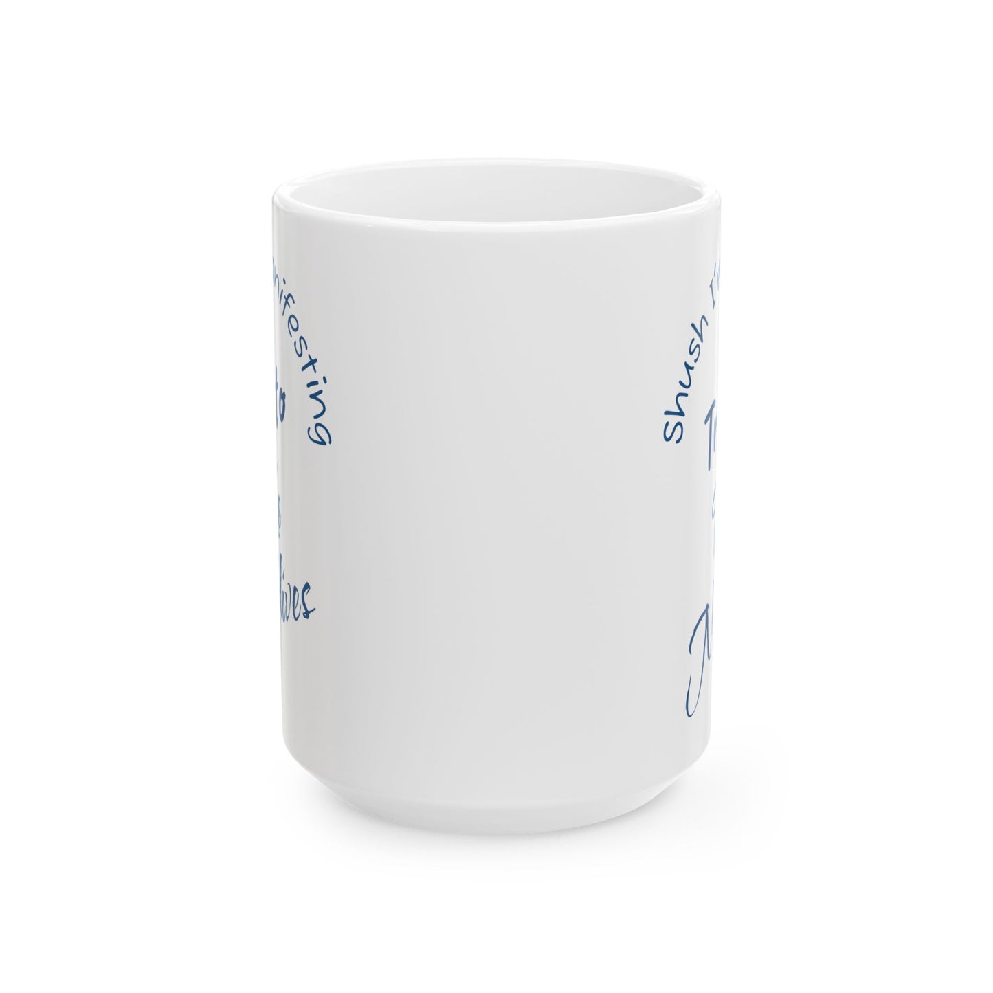 A Trip To The Maldives Ceramic Mug — 'Shush I'm Manifesting' In Blue On White Coffee Cup (11oz & 15oz)